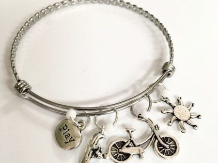 Charm bracelet; fun outdoors theme  canoe and bike on Sale