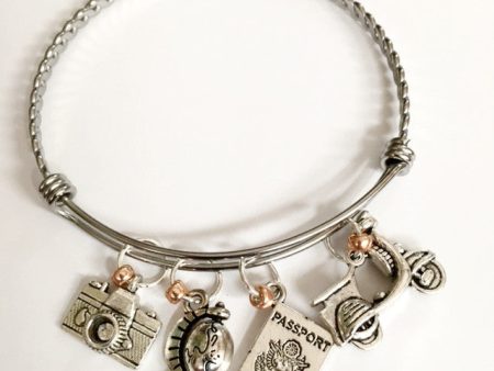 Charm bracelet; world traveler theme Nellie Bly Online now